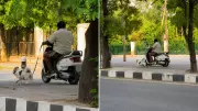 Lucknow Man Walks Dog While Riding Scooter, Video Goes Viral