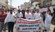 Main Bhi Cockroach Banners Appear on Rohtak Roads in Youth Protest