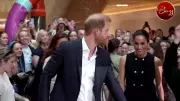 Meghan Markle Jokes About Renewing Vows With Harry in 'Budgie Smugglers' Moment