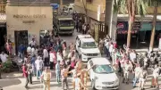 Mira Road Standoff: Policeman Carries Pig, Crowd Chases Amid Goat Dispute