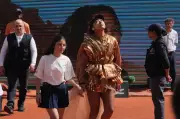 Naomi Osaka's Golden Dress Shines as She Reaches French Open Fourth Round