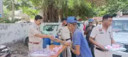 Rewari Police Provide Relief to Commuters Amid Rising Temperatures