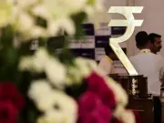 Rupee Faces Pressure Amid Oil Surge and FII Outflows: Analysts