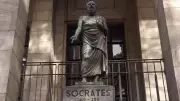 Socrates Quote on Strong Minds Discussing Ideas Still Relevant Today