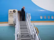 Trump Departs China with Signature Fist Pump After Historic Visit