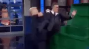 Trump shares AI video of him tossing Stephen Colbert into dumpster