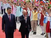 Xi Jinping and Putin Hold In-Depth Talks at International Summit