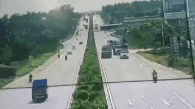 CCTV Captures Truck Crashing Through Median on Bengaluru Highway