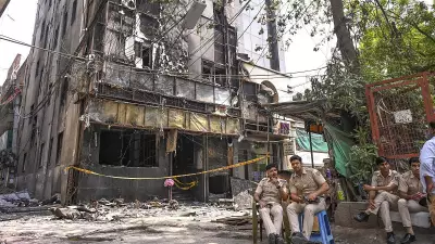 Delhi Fire Victim's Family Searches for Missing Belongings