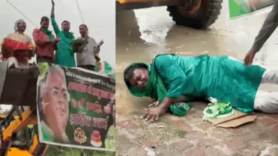 RJD Worker Falls While Cutting Cake on JCB at Lalu Prasad's Birthday Bash