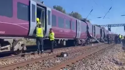 Two Trains Collide in Bedford Area; Emergency Services Respond