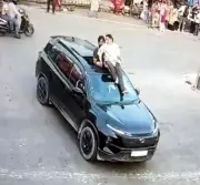 Haryana Couple Fined Rs 3,500 for Dangerous Stunt on Moving SUV in Dehra