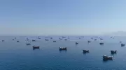 Iran Shuts Strait of Hormuz, Threatens Vessels After US Bombardment
