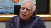 Kapil Sibal Demands Disqualification of Rebel TMC MPs Over Merger Plan