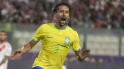 Marquinhos consoles Gabriel Magalhaes after Champions League penalty miss