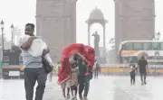 Rain-kissed Delhi: Life under grey skies as monsoon brings relief