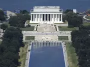 Trump warns monument vandals of 10-year prison sentence after Reflecting Pool restored