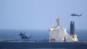 US and Iran Continue Offensive: Navy Boards Tanker, Iran Fires Warning Missiles
