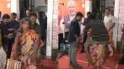 Woman carries disabled husband on back to CM's grievance meet in Kolkata