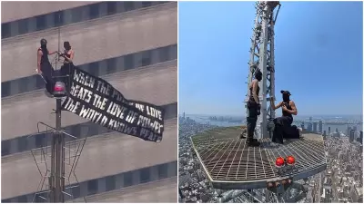 Protesters Scale Empire State Building with Peace Banner in NYC