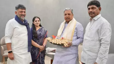 Shivakumar Meets Siddaramaiah with Family on His One Month as CM