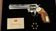 Erdogan gifts NATO leaders vintage revolver and live ammunition after summit