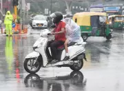 Monsoon Fury Grips India: Floods, Building Collapse, Widespread Disruption